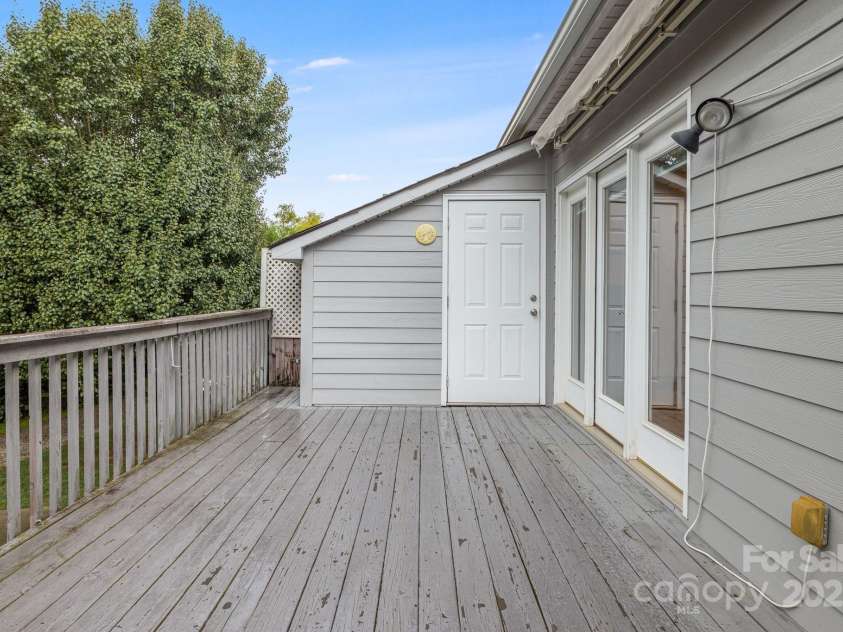 20 Holiday Drive, Arden, NC 28704.  MLS# CAR4186032, YatesRealty ID 12508. Back Deck On Main Level