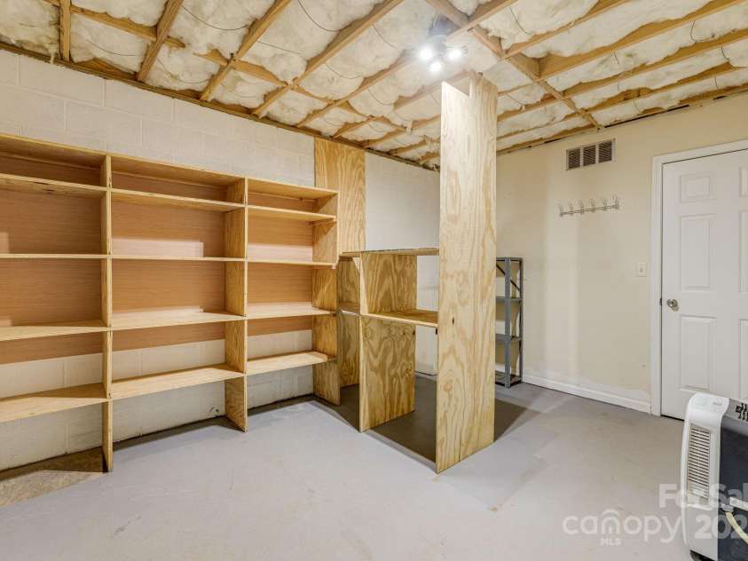 20 Holiday Drive, Arden, NC 28704.  MLS# CAR4186032, YatesRealty ID 12508. Basement Storage Space