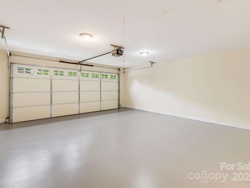 20 Holiday Drive, Arden, NC 28704.  MLS# CAR4186032, YatesRealty ID 12508. Main Level- 2 Car Garage