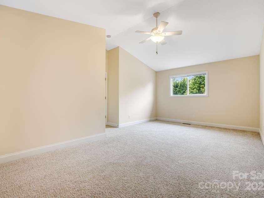 20 Holiday Drive, Arden, NC 28704.  MLS# CAR4186032, YatesRealty ID 12508. Upstairs Primary Bedroom