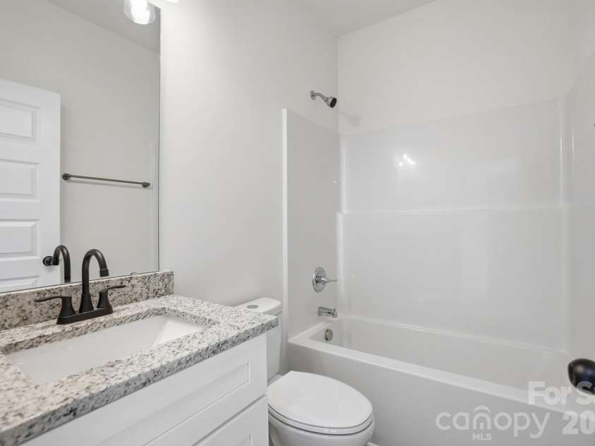 711 Adams Street, Monroe, NC 28110.  MLS# CAR4371348, YatesRealty ID 12518. 