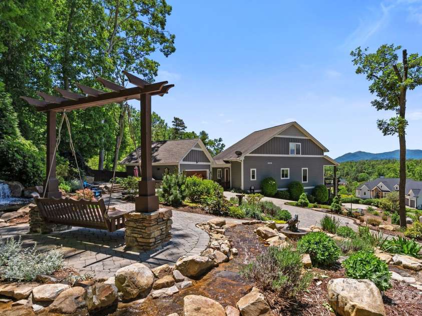 6 Temujin Drive, Leicester, NC 28748.  MLS# CAR4285175, YatesRealty ID 1252. Breathtaking Landscaping & Mountain views