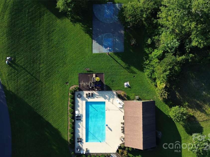 6 Temujin Drive, Leicester, NC 28748.  MLS# CAR4285175, YatesRealty ID 1252. Community pool, basketball & playground