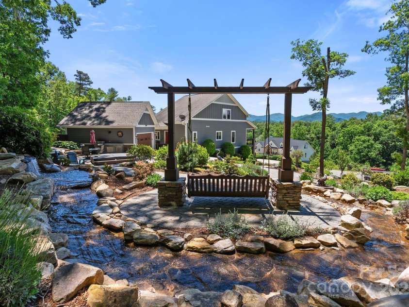 6 Temujin Drive, Leicester, NC 28748.  MLS# CAR4285175, YatesRealty ID 1252. Enjoy stunning mountain views from the swing