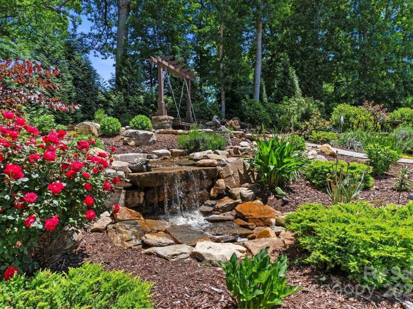 6 Temujin Drive, Leicester, NC 28748.  MLS# CAR4285175, YatesRealty ID 1252. Waterfall