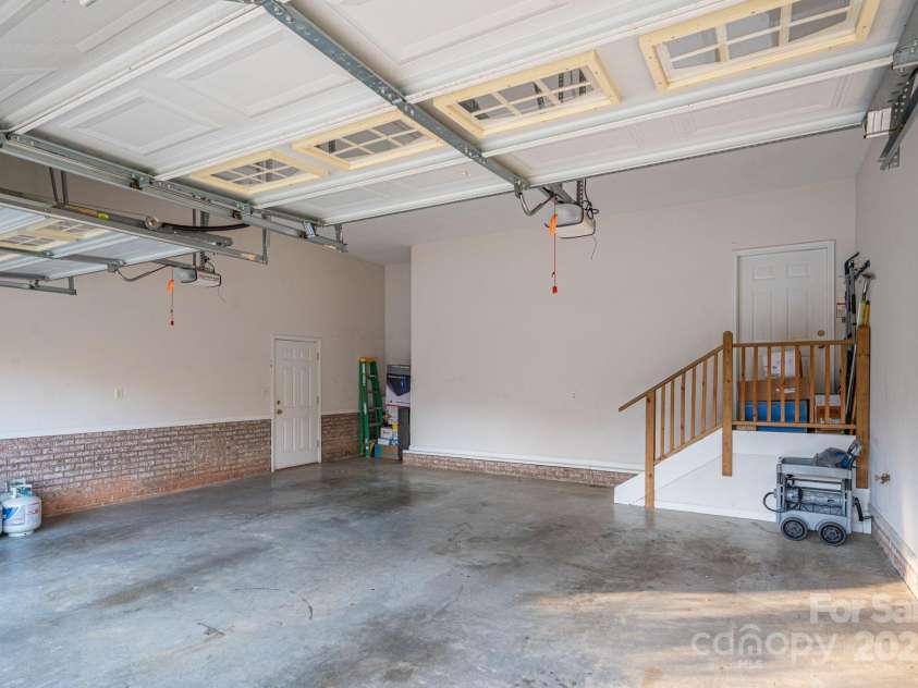7522 Turnberry Lane, Stanley, NC 28164.  MLS# CAR4321686, YatesRealty ID 1252. Upper Garage