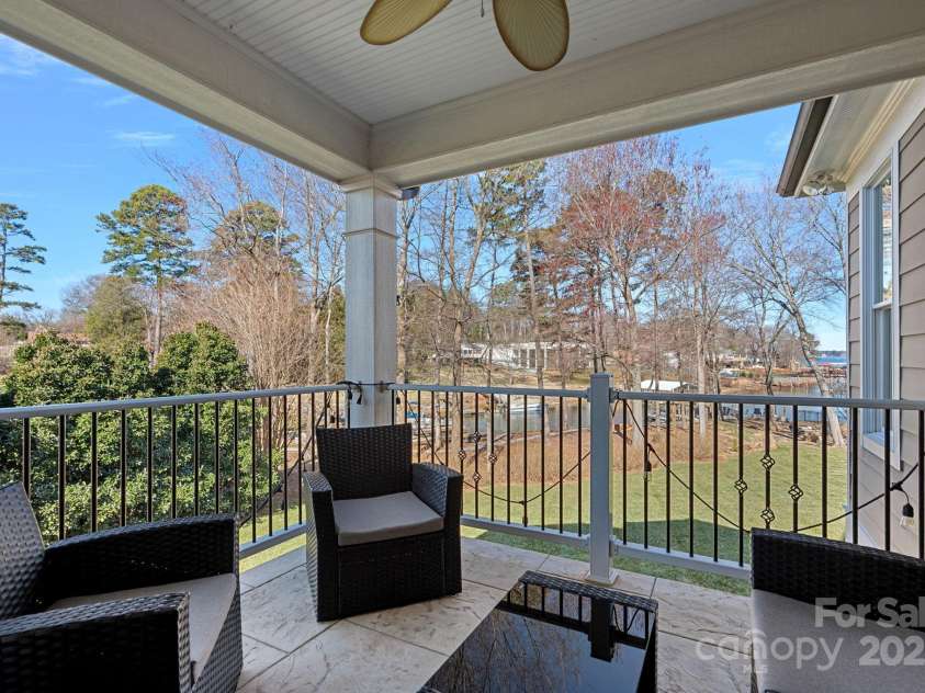 15015 NC Hwy 73 Highway, Huntersville, NC 28078.  MLS# CAR4226627, YatesRealty ID 12520. Additional covered balcony - perfect for your morning coffee - off of flex space/computer niche