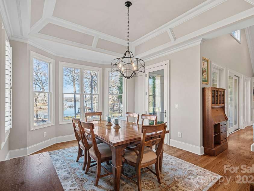 15015 NC Hwy 73 Highway, Huntersville, NC 28078.  MLS# CAR4226627, YatesRealty ID 12520. Beautiful, formal dining room with custom architectural details and lake views.