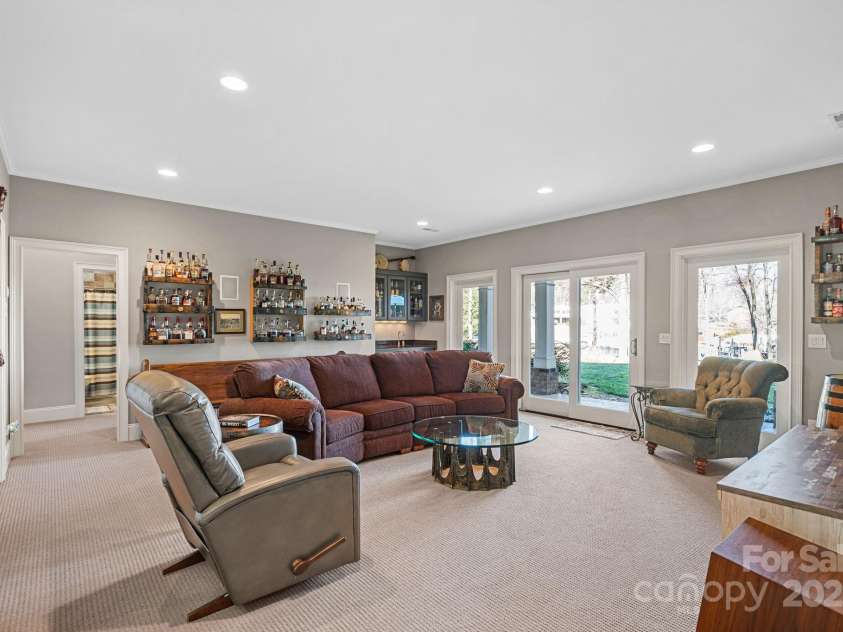 15015 NC Hwy 73 Highway, Huntersville, NC 28078.  MLS# CAR4226627, YatesRealty ID 12520. Bonus room in walk-out basement with lake views and access to covered patio.