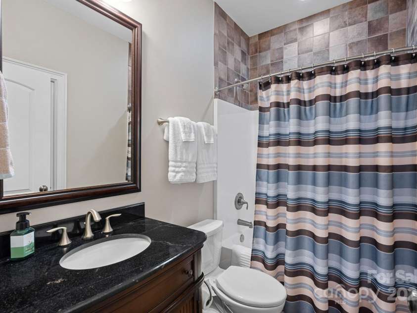 15015 NC Hwy 73 Highway, Huntersville, NC 28078.  MLS# CAR4226627, YatesRealty ID 12520. Full bathroom off bonus room with access to guest bedroom