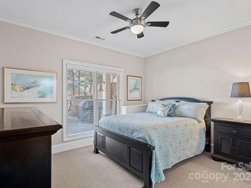15015 NC Hwy 73 Highway, Huntersville, NC 28078.  MLS# CAR4226627, YatesRealty ID 12520. Guest bedroom #2 with lake views and ensuite