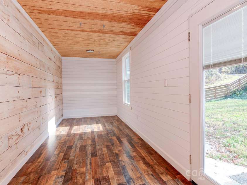 89 Flynn Branch Road, Asheville, NC 28804.  MLS# CAR4198196, YatesRealty ID 12530. The shipping container also has a locking storage space at the end.