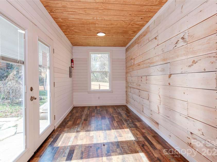 89 Flynn Branch Road, Asheville, NC 28804.  MLS# CAR4198196, YatesRealty ID 12530. This shipping container is great flex space... what will it be for you? Office, play room, yoga studio, etc?