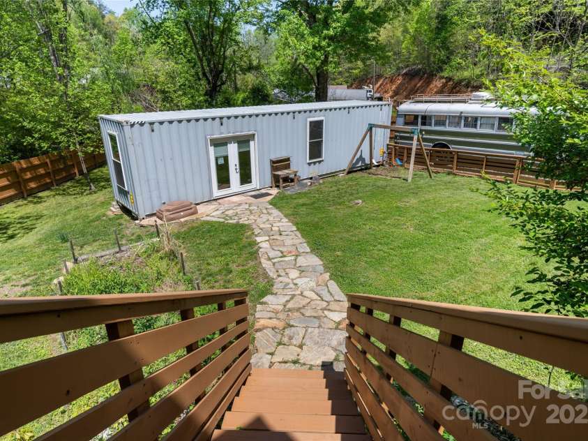 89 Flynn Branch Road, Asheville, NC 28804.  MLS# CAR4198196, YatesRealty ID 12530. View of container building from side deck