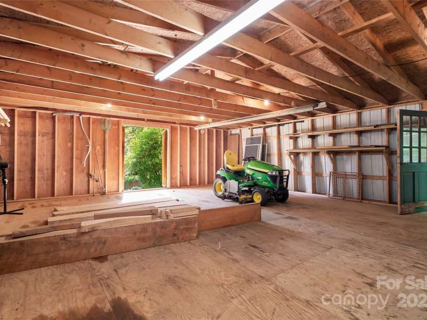 116 Sams Branch Road, Candler, NC 28715.  MLS# CAR4137587, YatesRealty ID 1254. Garage has grown entry loft 