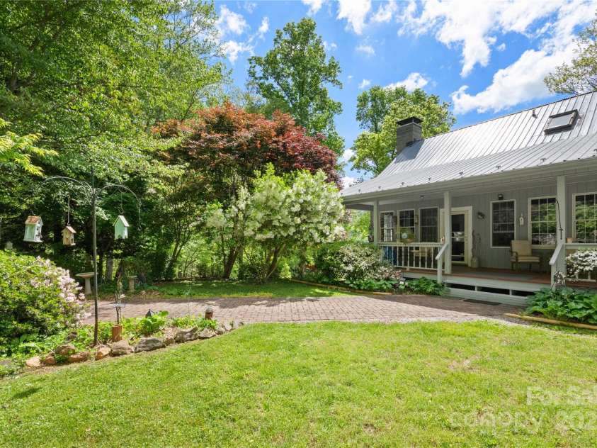 116 Sams Branch Road, Candler, NC 28715.  MLS# CAR4137587, YatesRealty ID 1254. Nice, level yard