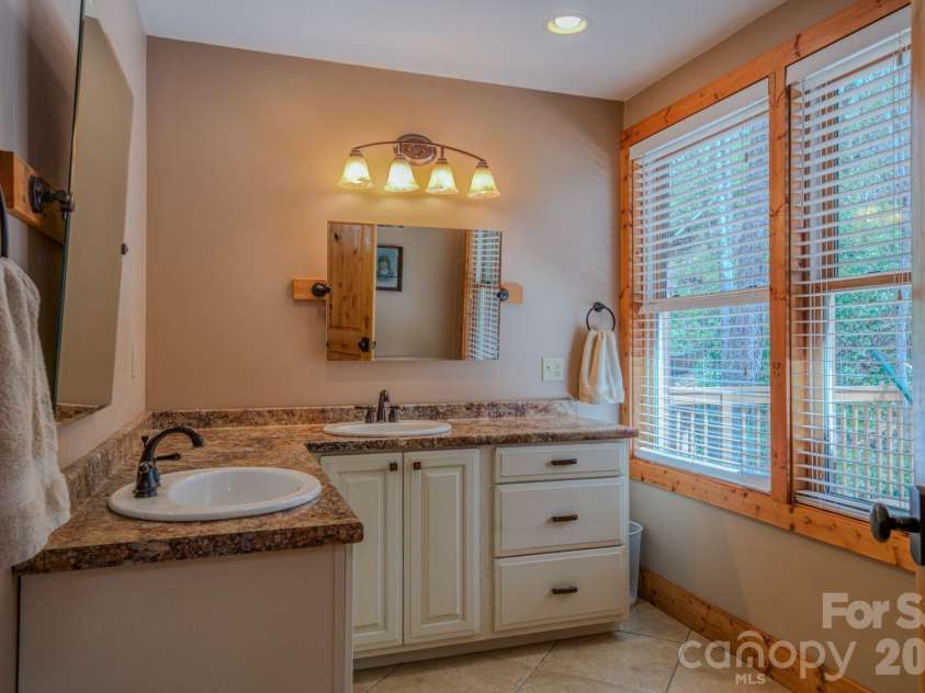 426 Cook Town Road, Bakersville, NC 28705.  MLS# CAR4371118, YatesRealty ID 12540. Master bathroom