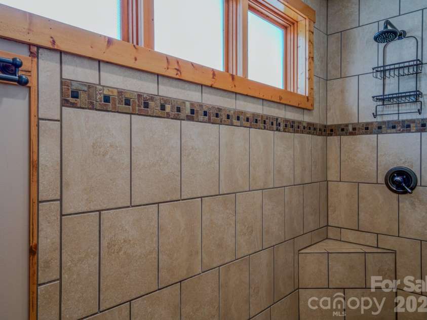 426 Cook Town Road, Bakersville, NC 28705.  MLS# CAR4371118, YatesRealty ID 12540. Master bathroom