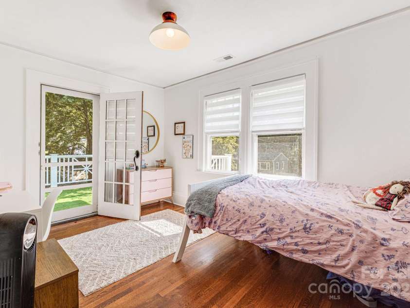 18 Robinwood Avenue, Asheville, NC 28806.  MLS# CAR4217226, YatesRealty ID 12548. One Bedroom has Door to Private Roof Deck