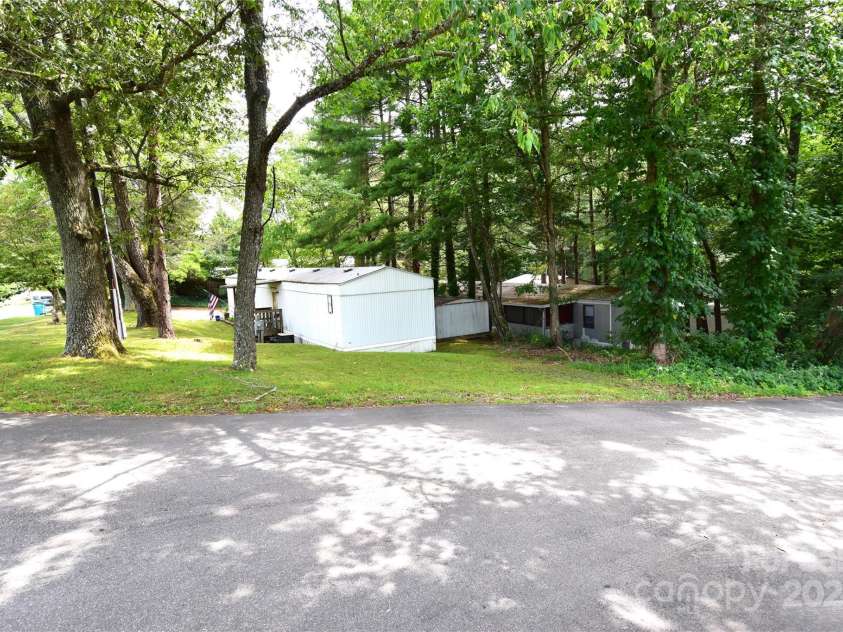 295 Asbury Road, Candler, NC 28715.  MLS# CAR4308375, YatesRealty ID 1255. 