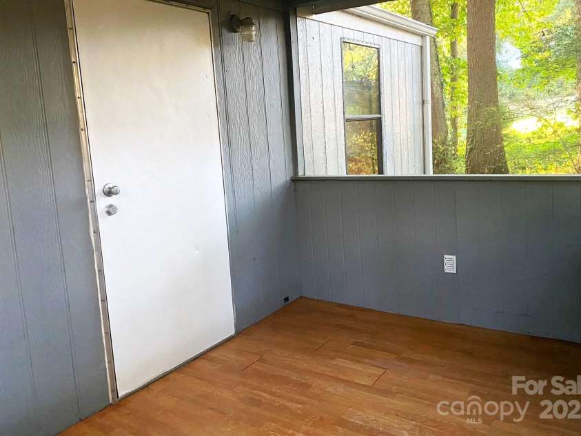 295 Asbury Road, Candler, NC 28715.  MLS# CAR4308375, YatesRealty ID 1255. 