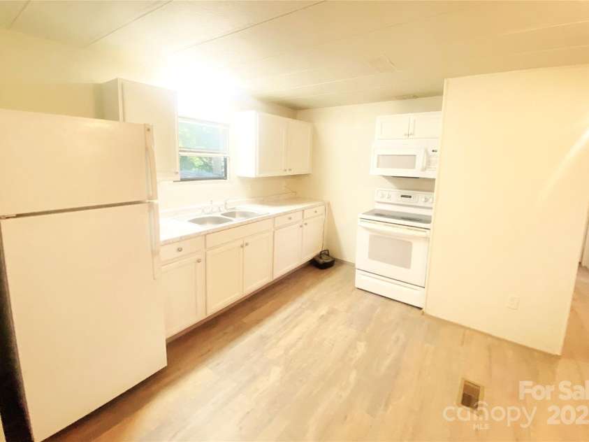 295 Asbury Road, Candler, NC 28715.  MLS# CAR4308375, YatesRealty ID 1255. 