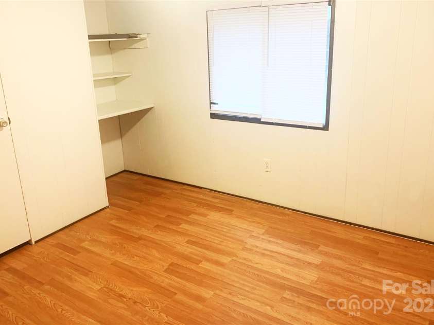 295 Asbury Road, Candler, NC 28715.  MLS# CAR4308375, YatesRealty ID 1255. 