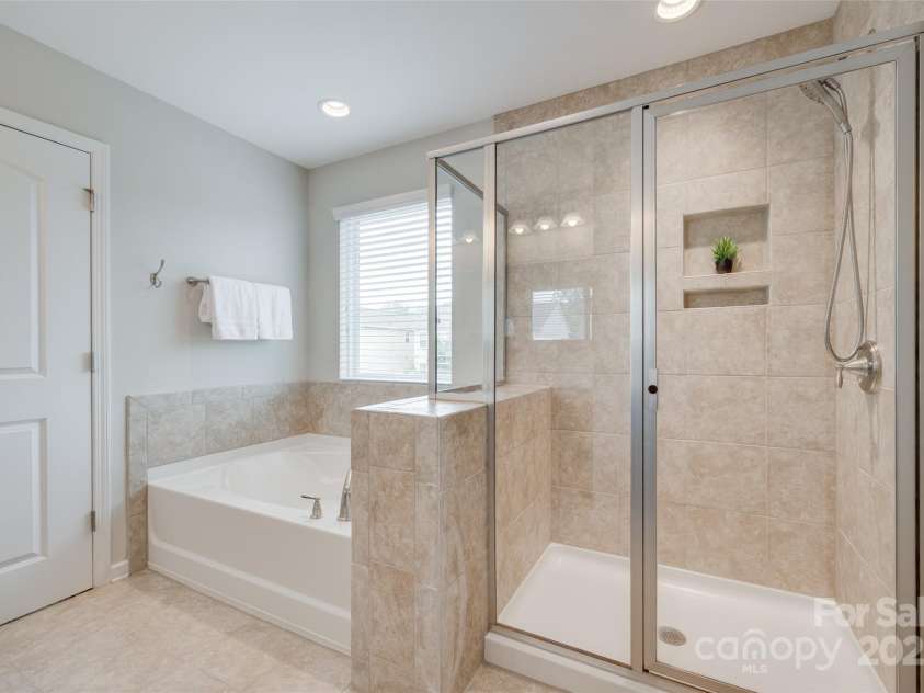 1507 Arcadia Bluff Drive, York, SC 29745.  MLS# CAR4252388, YatesRealty ID 12550. Soaking Tub and Walk in Tile Shower