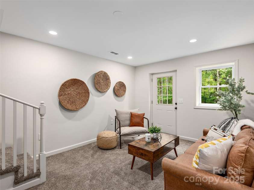 16 Emerson Poore Drive, Candler, NC 28715.  MLS# CAR4256902, YatesRealty ID 12551. Bonus room in basement