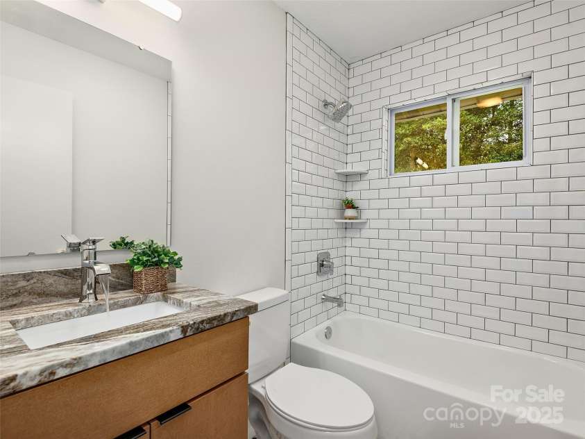 16 Emerson Poore Drive, Candler, NC 28715.  MLS# CAR4256902, YatesRealty ID 12551. Full bath on main level