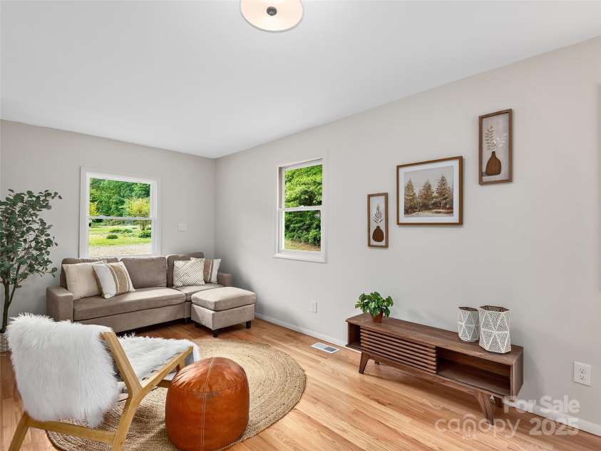 16 Emerson Poore Drive, Candler, NC 28715.  MLS# CAR4256902, YatesRealty ID 12551. Living room