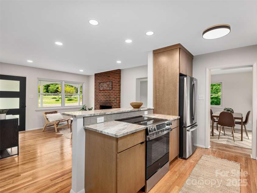 16 Emerson Poore Drive, Candler, NC 28715.  MLS# CAR4256902, YatesRealty ID 12551. New cabinets & appliances in kitchen