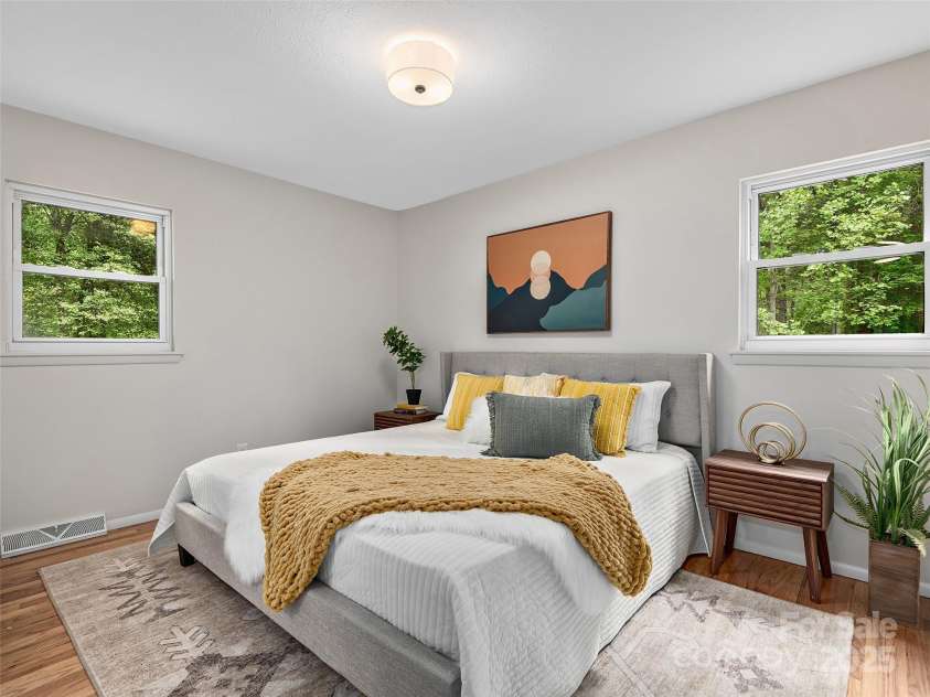 16 Emerson Poore Drive, Candler, NC 28715.  MLS# CAR4256902, YatesRealty ID 12551. Primary bedroom on main level
