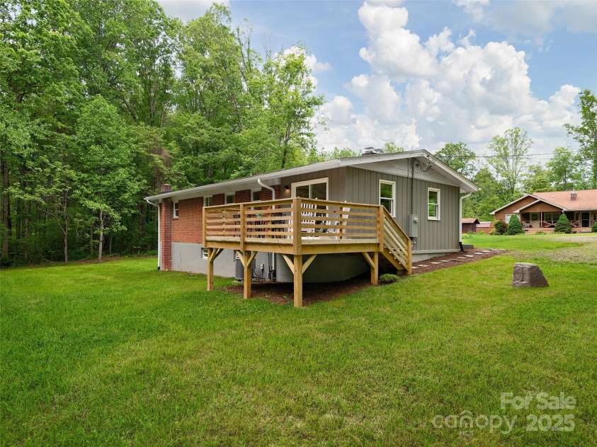 16 Emerson Poore Drive, Candler, NC 28715.  MLS# CAR4256902, YatesRealty ID 12551. View of rear of home