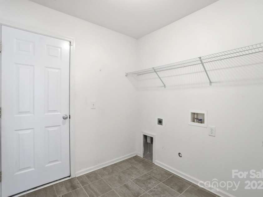 630 Springhouse Place, Clover, SC 29710.  MLS# CAR4278014, YatesRealty ID 12553. Laundry Room