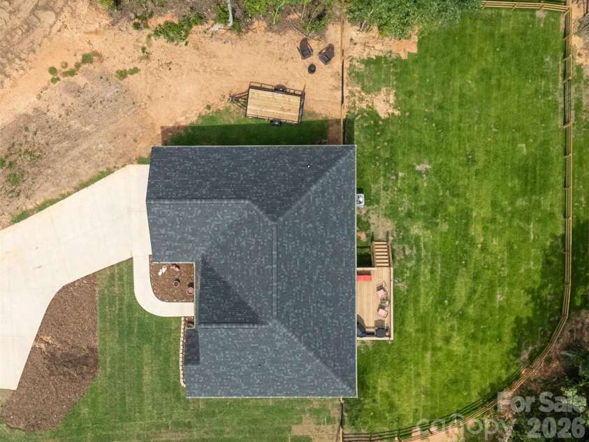 98 Lexxi Lane, Tryon, NC 28782.  MLS# CAR4410440, YatesRealty ID 12560. Lexxi Lane 98 Property from overhead during sodding days.