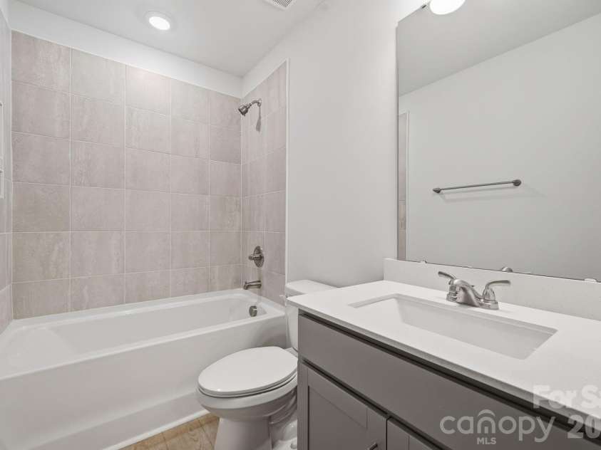 5107 Orchardview Way, Charlotte, NC 28216.  MLS# CAR4241432, YatesRealty ID 12561. 2nd floor hall bathroom