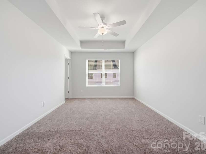 5107 Orchardview Way, Charlotte, NC 28216.  MLS# CAR4241432, YatesRealty ID 12561. Primary Bedroom with 9' Tray Ceiling