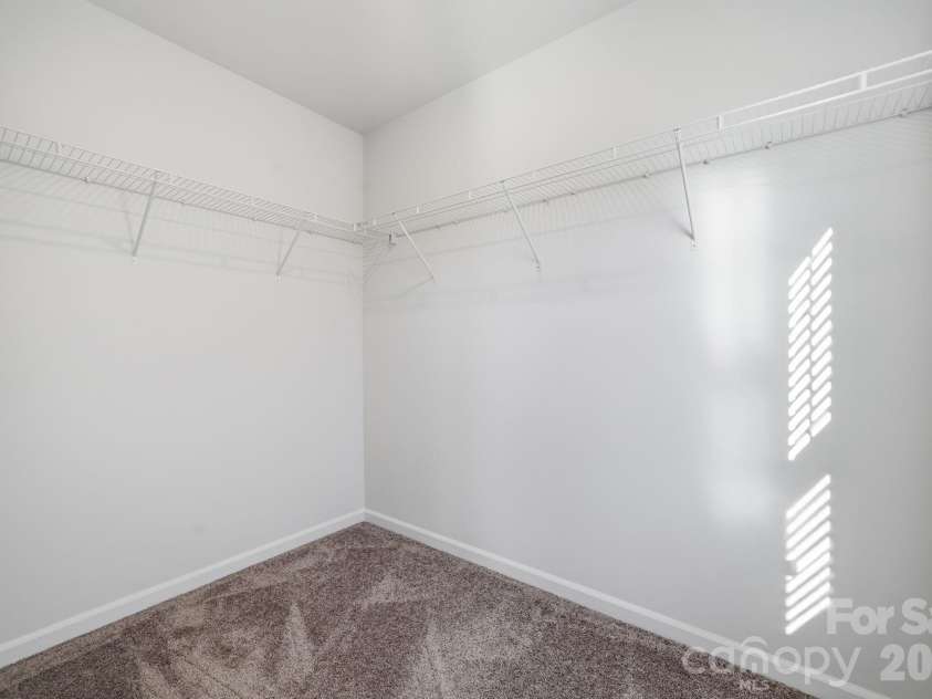 5107 Orchardview Way, Charlotte, NC 28216.  MLS# CAR4241432, YatesRealty ID 12561. Primary Closet with window
