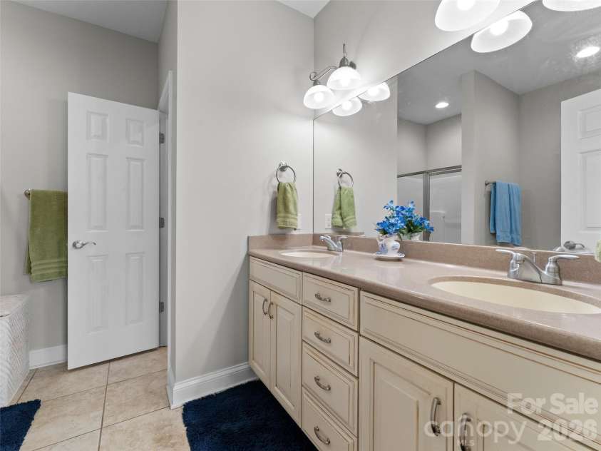 22 Florian Lane, Fletcher, NC 28732.  MLS# CAR4279113, YatesRealty ID 12574. Primary bathroom