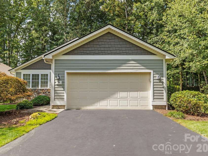 241 Fairway View Drive, Etowah, NC 28729.  MLS# CAR4304614, YatesRealty ID 12577. Front facing garage