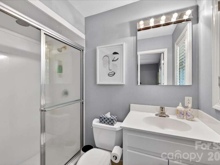 3229 Zelda Lane, Matthews, NC 28105.  MLS# CAR4366492, YatesRealty ID 12580. 2nd Primary Bathroom