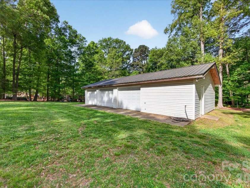 3229 Zelda Lane, Matthews, NC 28105.  MLS# CAR4366492, YatesRealty ID 12580. 3 car garage