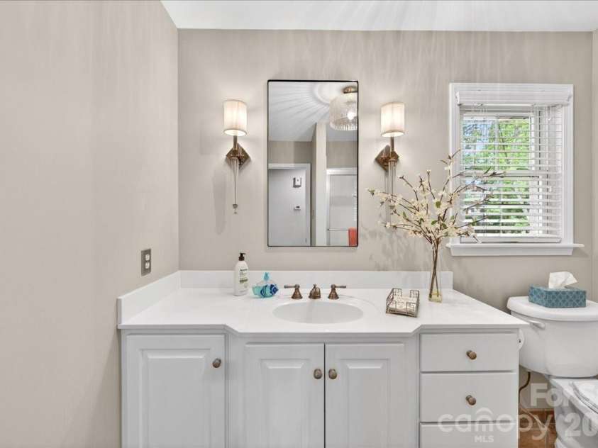 3229 Zelda Lane, Matthews, NC 28105.  MLS# CAR4366492, YatesRealty ID 12580. Bathroom off the Hall