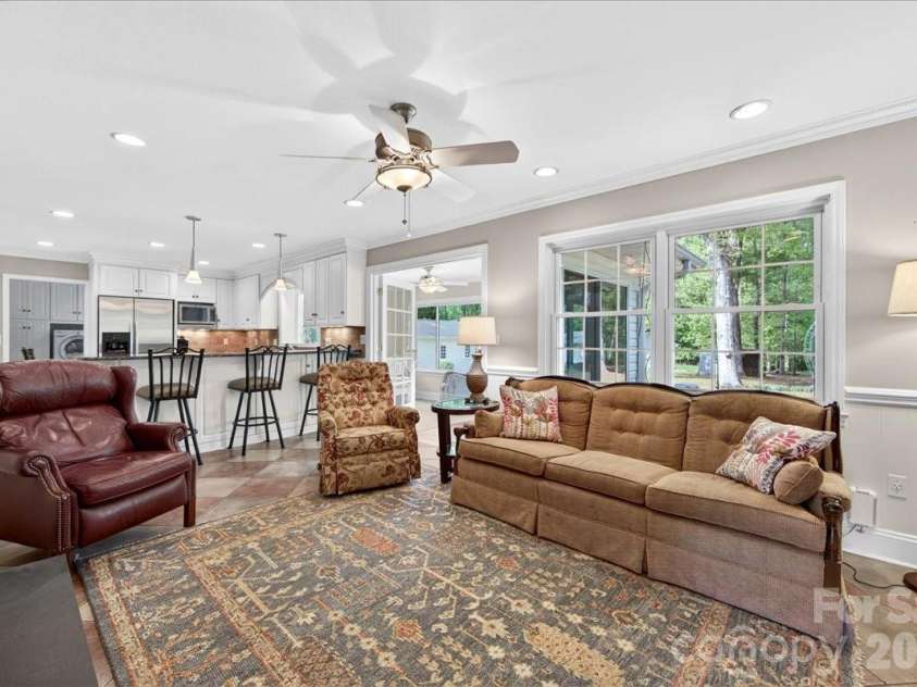 3229 Zelda Lane, Matthews, NC 28105.  MLS# CAR4366492, YatesRealty ID 12580. Den 