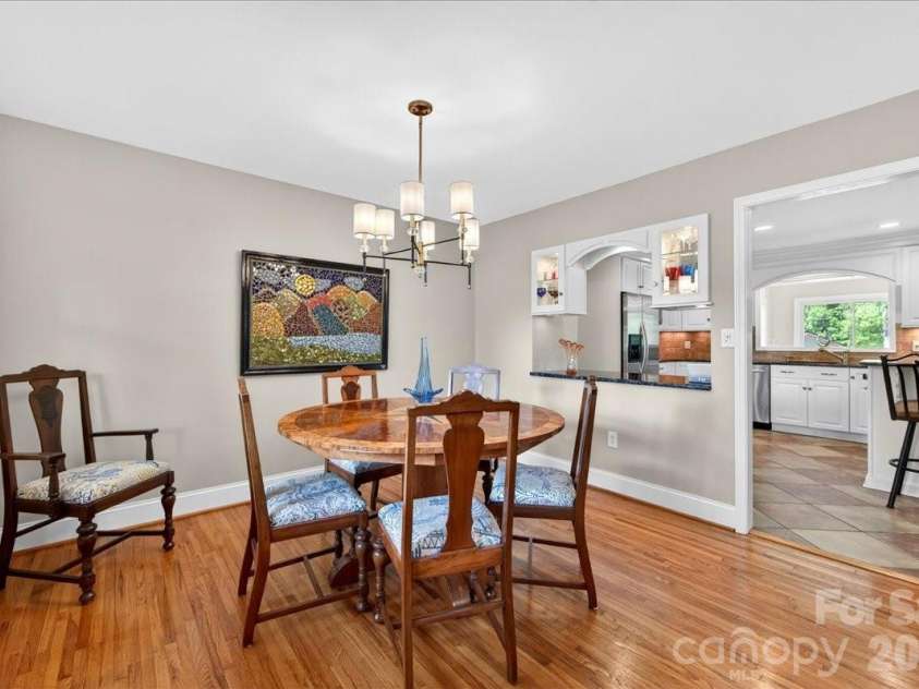3229 Zelda Lane, Matthews, NC 28105.  MLS# CAR4366492, YatesRealty ID 12580. Dining Room view into Kitchen
