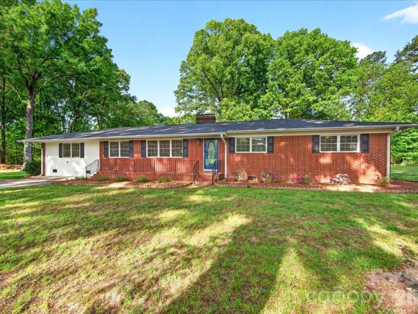 3229 Zelda Lane, Matthews, NC 28105.  MLS# CAR4366492, YatesRealty ID 12580. Front of the Home