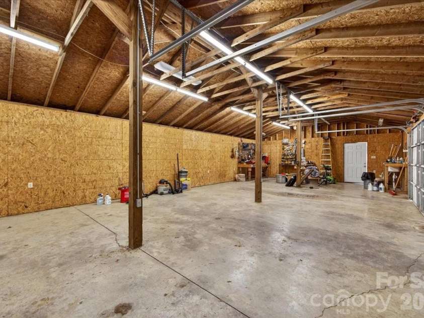 3229 Zelda Lane, Matthews, NC 28105.  MLS# CAR4366492, YatesRealty ID 12580. Garage interior