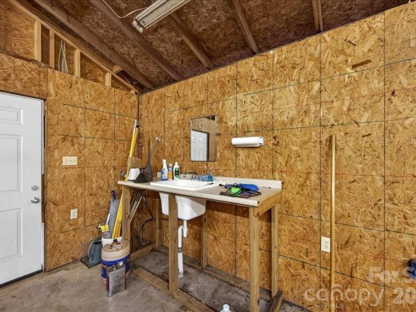 3229 Zelda Lane, Matthews, NC 28105.  MLS# CAR4366492, YatesRealty ID 12580. Garage sink