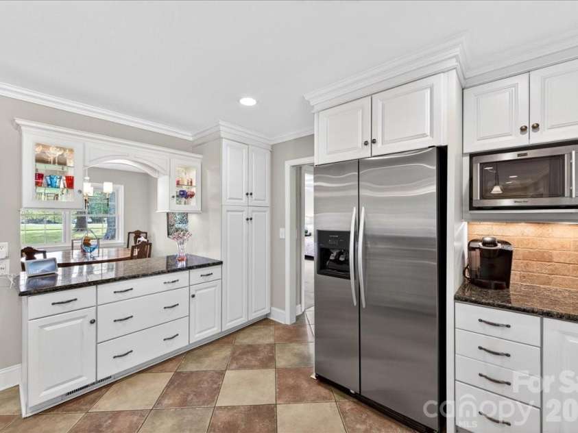 3229 Zelda Lane, Matthews, NC 28105.  MLS# CAR4366492, YatesRealty ID 12580. Kitchen